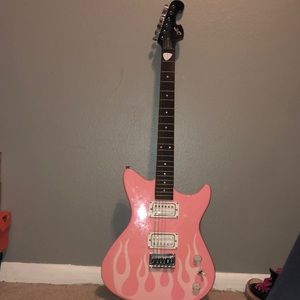 Pink electric guitar